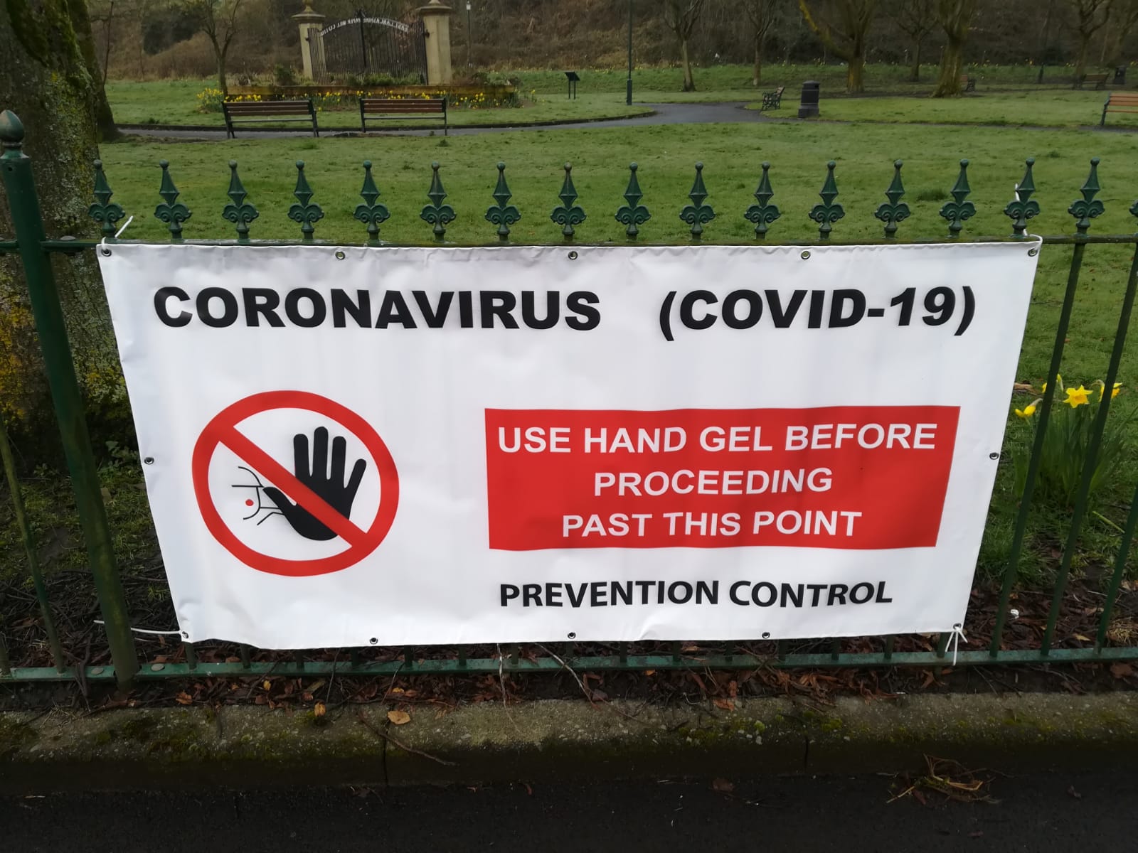 COVID fence banner awareness sign